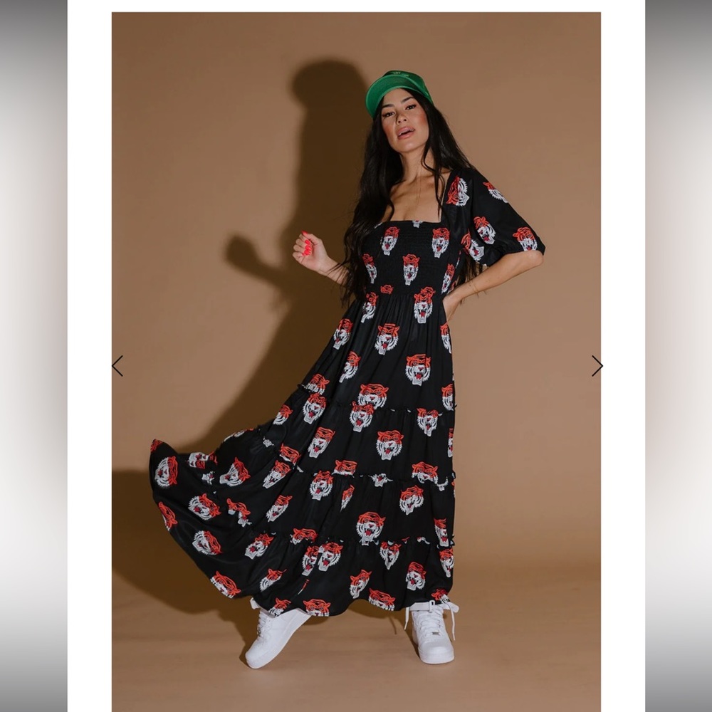 DRESSED IN LALA TIGER DRESS- ISO